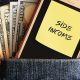 Cash dollars money and mobile phone in jean pocket with note written SIDE INCOME, concept of earning extra cash from side job , side hustle or make more income from online business