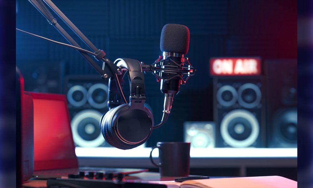 Professional microphone and headphones at the radio station, entertainment and communication concept