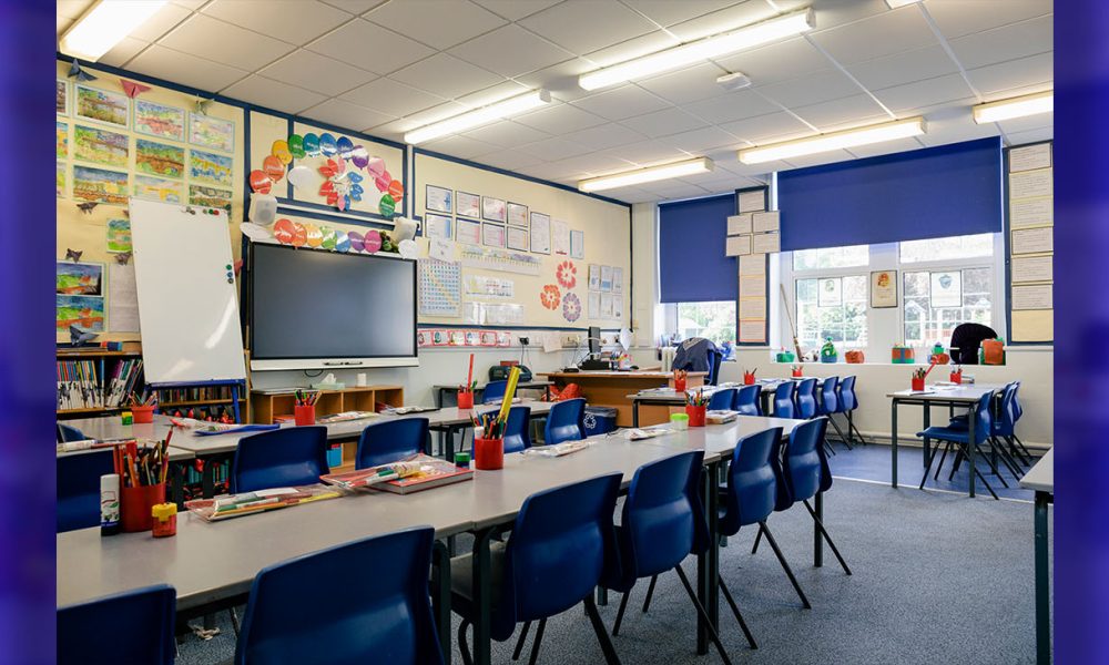 A wide angle view of an organised and tidy classroom in a school in Hexham in the North East of England