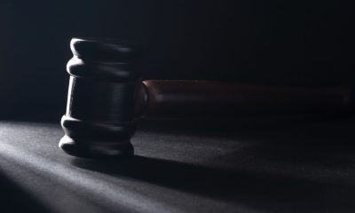 Gavel on the black table.