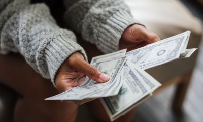 Closeup of woman counting money