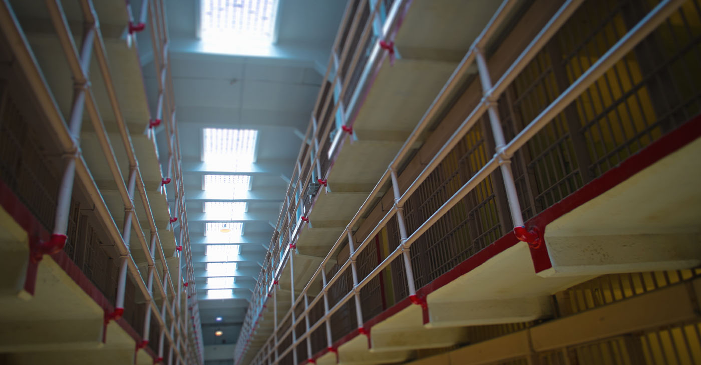 Corridor in Alcatraz Prison with cells of to the sides (Photo by Owen JC Smith)