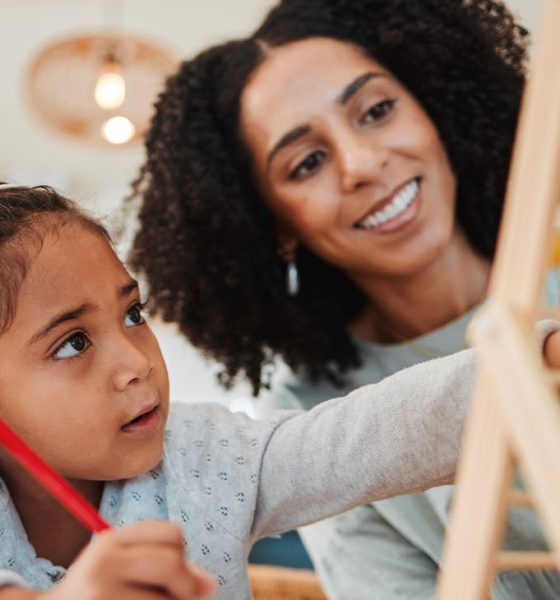 Math, child learning and mother for home education, numbers support or helping in kindergarten development. Happy mom, woman and girl kid writing abacus numbers on paper, school and family teaching (Jacob Wackerhausen)