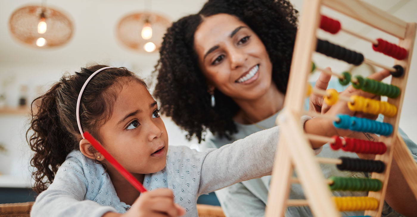 Math, child learning and mother for home education, numbers support or helping in kindergarten development. Happy mom, woman and girl kid writing abacus numbers on paper, school and family teaching (Jacob Wackerhausen)