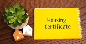 Housing certificate notebook. Obtaining new housing in exchange for one's own house or apartment destroyed due to war. Subsidies used to help with rent and homeowners expenses to purchase a home. (Photo by Andrii Yalanskyi)