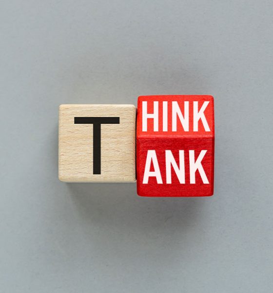 Think Tank symbol. wooden dice form the expression "think tank". Words conceptual, grey background, copy space (Photo by Andrzej Rostek)