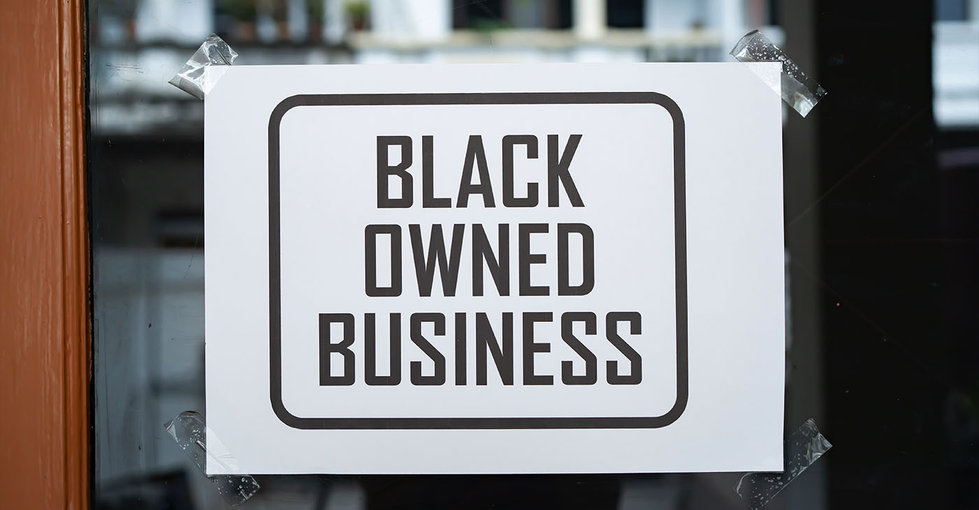 Black owned business sign was attached on the window
