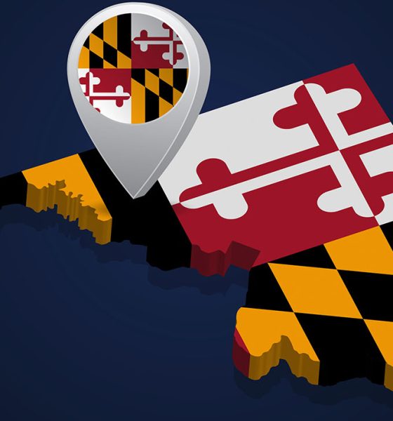 Flag of State of Maryland of USA on map on dark background. Vector illustration (Photo by Zloyel)