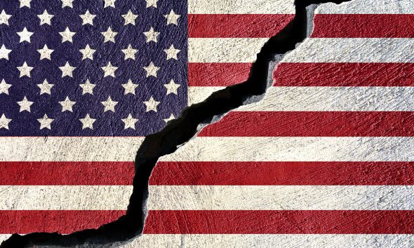 Concept american flag on cracked background (Photo by Jorge Villalba)