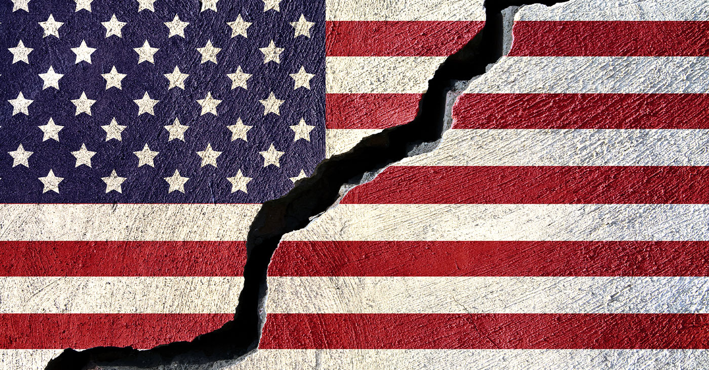 Concept american flag on cracked background (Photo by Jorge Villalba)