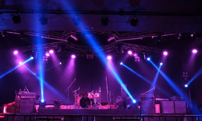 Stage lighting beams spotlight and smoke of events show or concerts