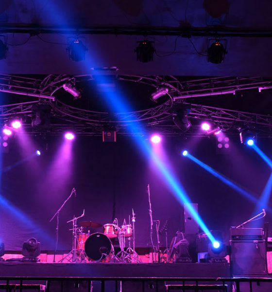 Stage lighting beams spotlight and smoke of events show or concerts