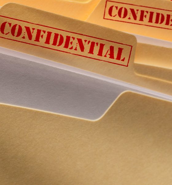 A stack of confidential files.
