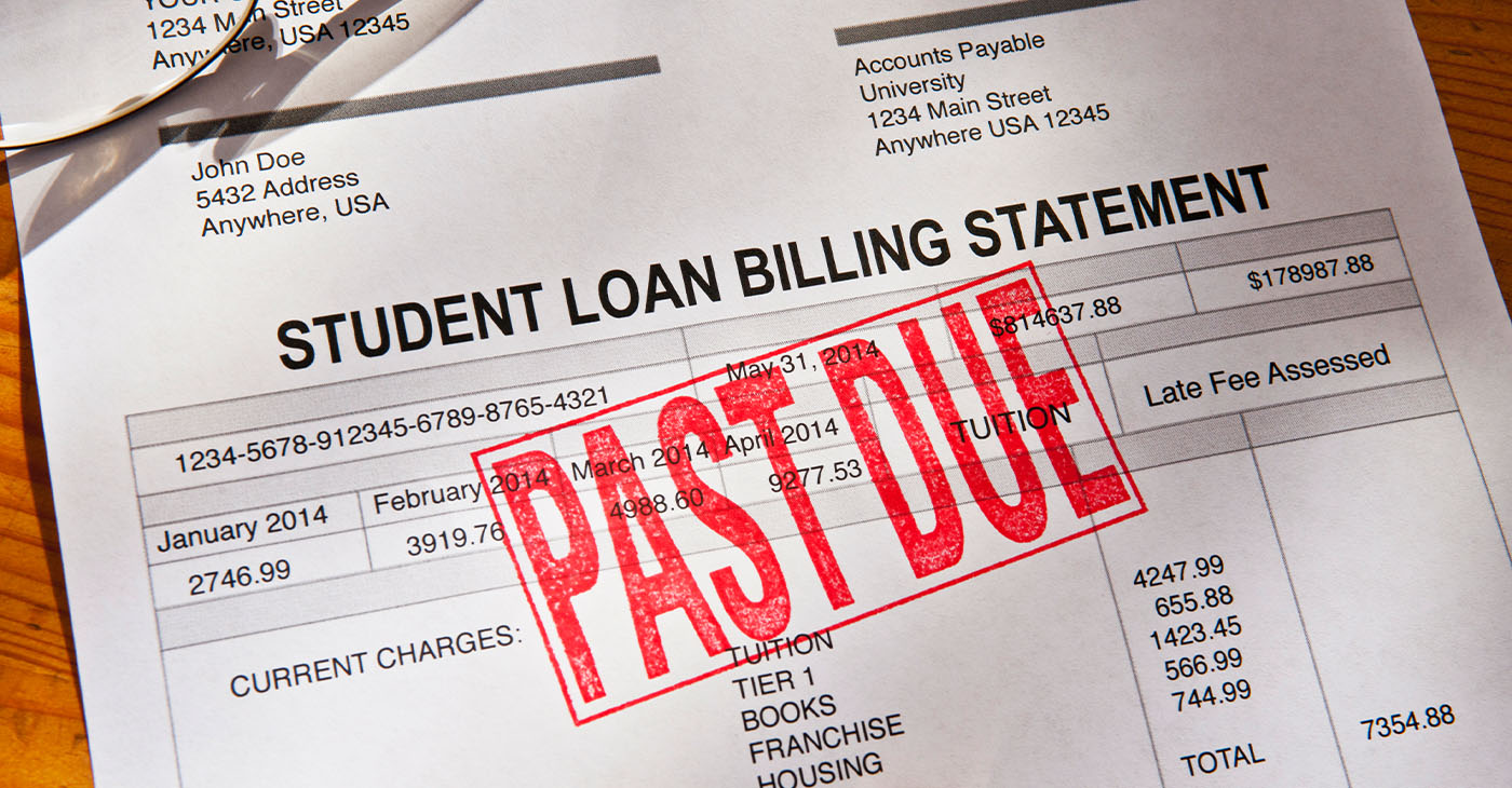 Statement for a Student Loan on a desktop. Loan is PAST DUE with a red rubber stamp. Props include reading glasses, coffee cup and pen. Horizontal photograph. PAST DUE is bright red against the white form. Shot from a high angle looking down. Dramatic lighting with some shadows.