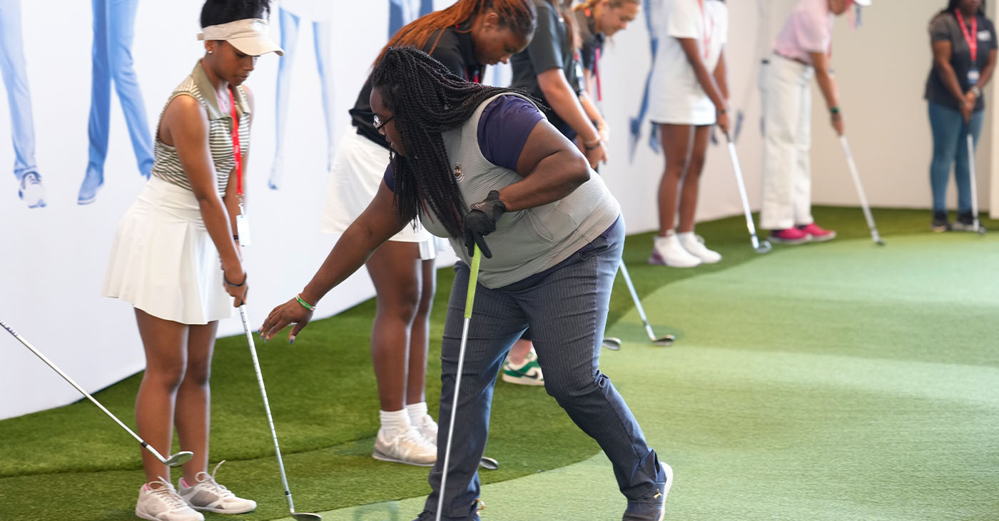 Tiana Jones, PGA, gives putting instructions to PGA WORKS participants during the PGA WORKS Beyond The Green clinic at the Home of the PGA of America at PGA Frisco on Monday, June 16, 2025 in Firsco, Texas. 