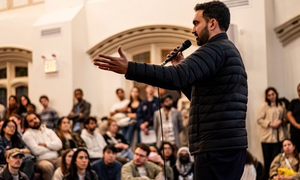 Zohran Mamdani Speaking at a DSA 101 Meeting at the Church of the Village in NYC. Photo by Bingjiefu He.