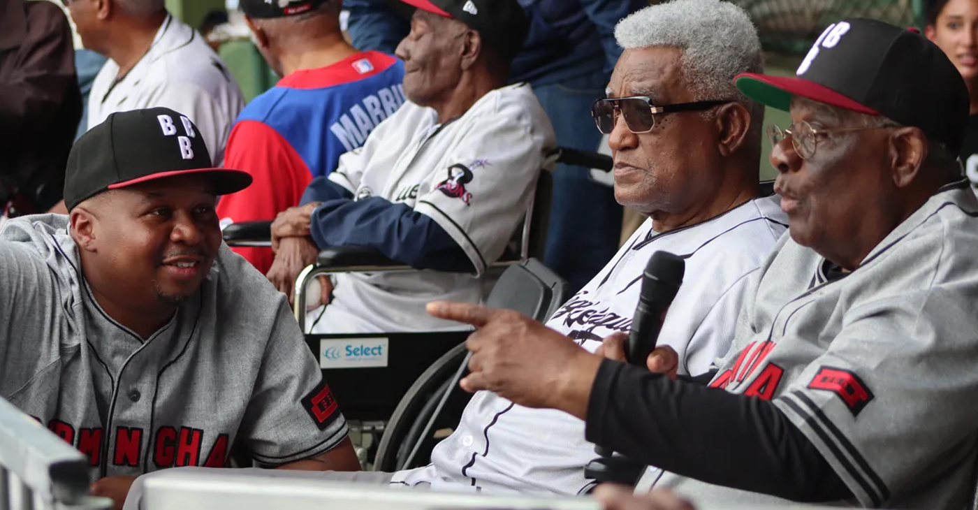Ron Wood (left) talks to Negro League legend Al Holt (right).