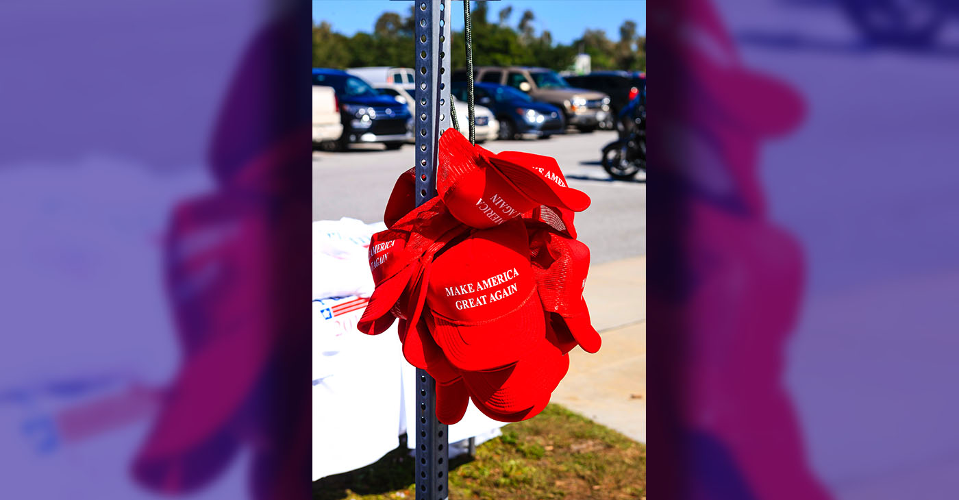 Sarasota, FL, USA - November 28, 2015: Donald Trump for President "Make America Great Again" red baseball hats on sale at his Presidential candidate tour stop in Sarasota FL