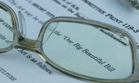 Closeup of the documents of the One Big Beautiful Bill Act (OBBBA), a budget reconciliation bill in the 119th United States Congress.