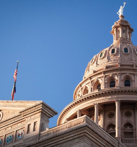 Texas state capitol building dome with a blue sky in the background