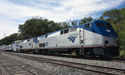 Lamy, United States - September 8, 2015:The eastbound Amtrak Southwest Chief passenger train at Lamy, New Mexico, USA. The train has travelled overnight from Los Angeles and is heading for Chicago. The train is powered by a pair of GE P42DC, numbers 187 and 198, and a single EMD F59PHI locomotive, number 455, all diesels. This train, and its westbound counterpart, are the only two trains to traverse this route per day as it has no freight service. Unidentified crew.