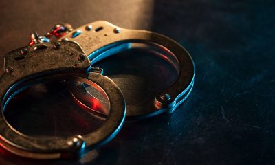 Handcuffs on dark background