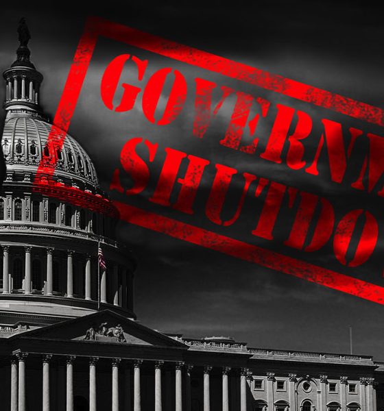 The United States capitol building with a crack and red Government Shutdown stamp
