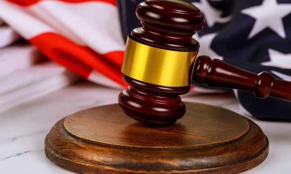 American flag judge gavel is symbol of justice legal system in United States