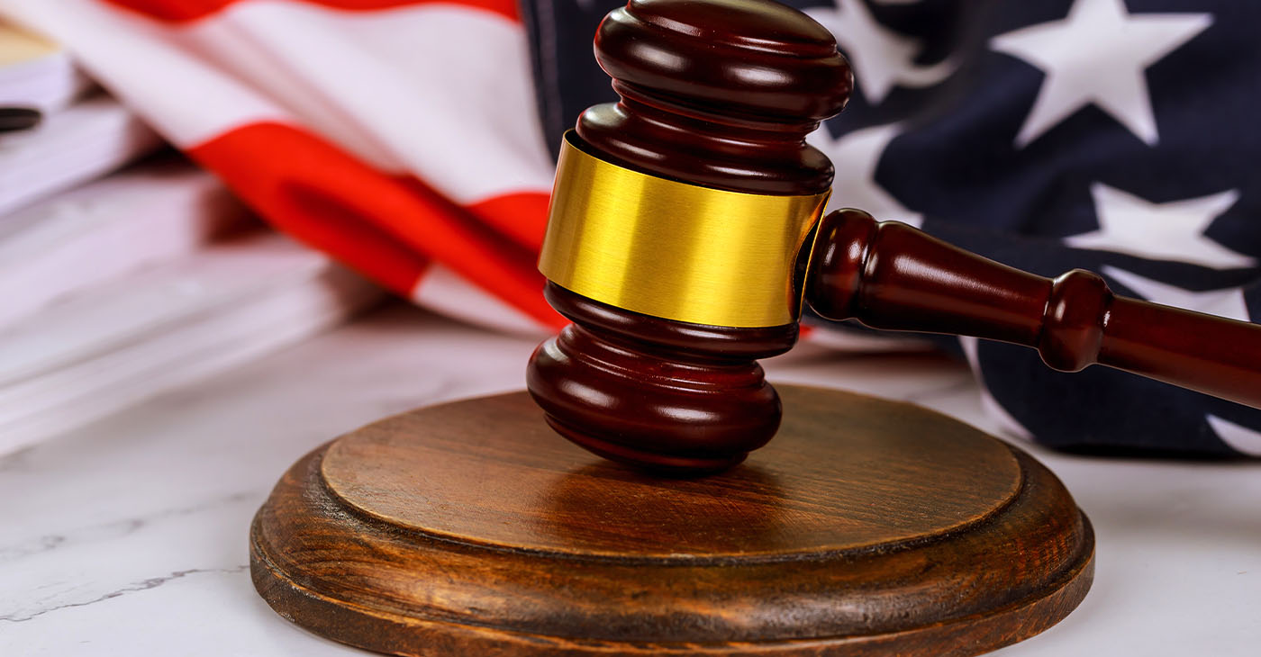 American flag judge gavel is symbol of justice legal system in United States