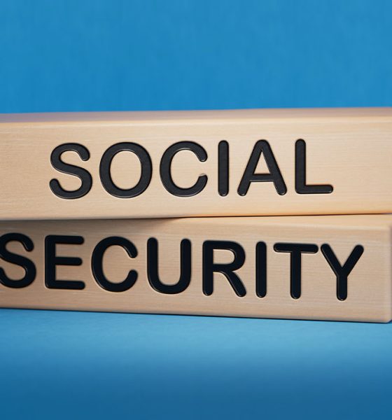 Time to social security symbol. Concept words Social security on wooden blocks. Business and social security concept. Copy space.3D rendering on blue background. (Photo by Bo Feng)