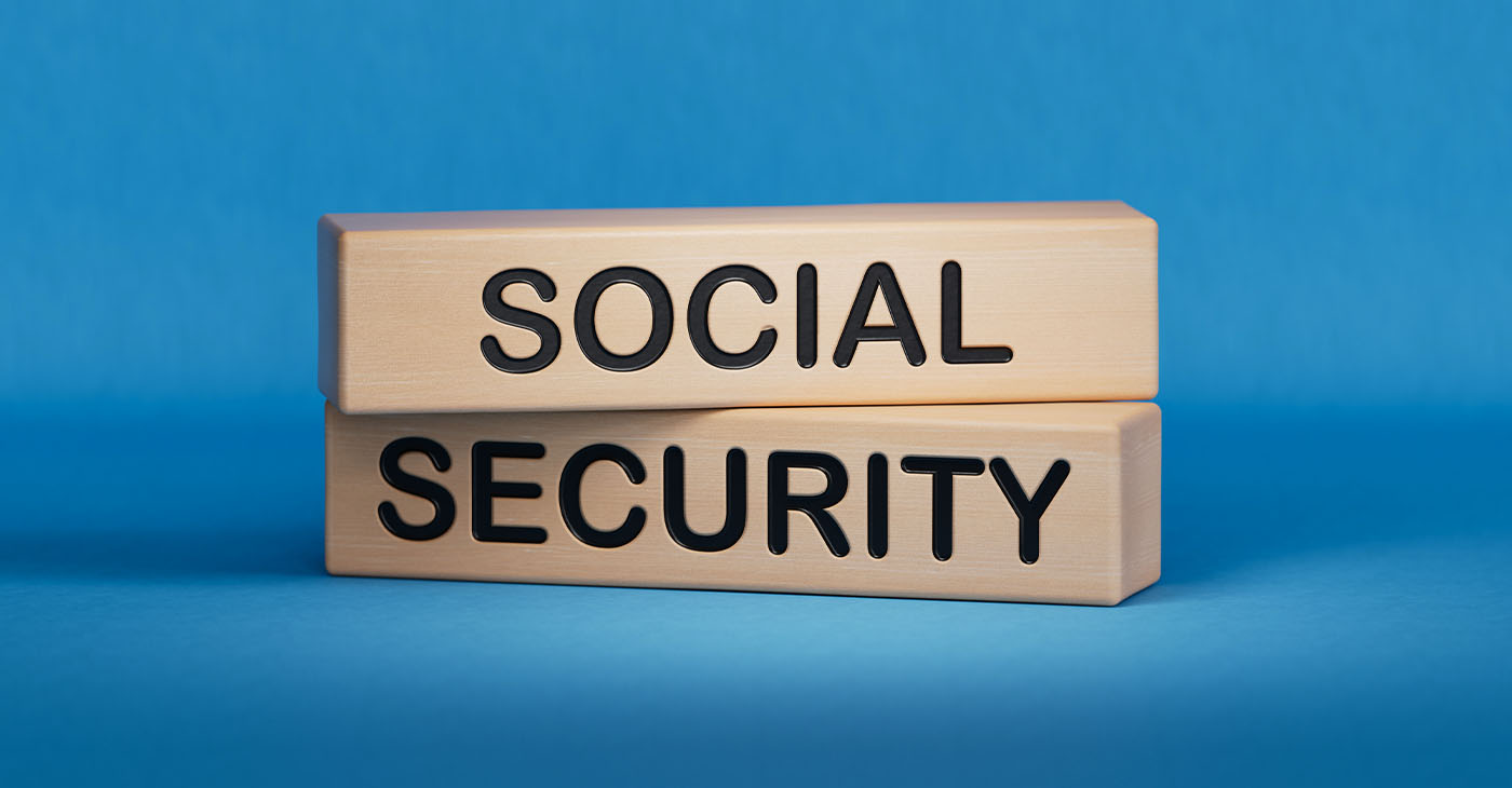 Time to social security symbol. Concept words Social security on wooden blocks. Business and social security concept. Copy space.3D rendering on blue background. (Photo by Bo Feng)