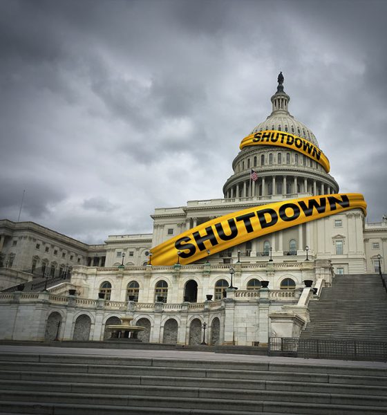 USA shutdown and United States government closed and american federal shut down due to spending bill disagreement between the left and the right pas a national finance symbol with yellow hazard tape in a 3D illustration style.