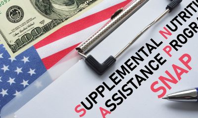 SNAP Supplemental Nutrition Assistance Program is shown using the text. SNAP provides food benefits to low-income families in US (Photo by Andrii Dodonov)