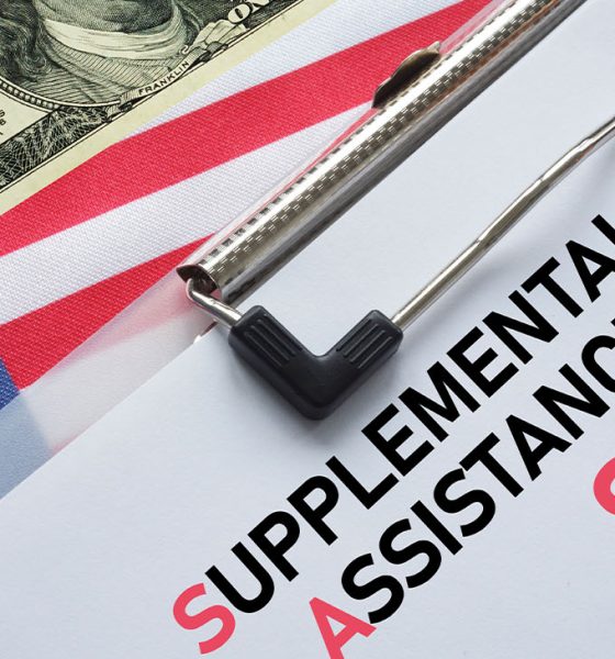 SNAP Supplemental Nutrition Assistance Program is shown using the text. SNAP provides food benefits to low-income families in US (Photo by Andrii Dodonov)