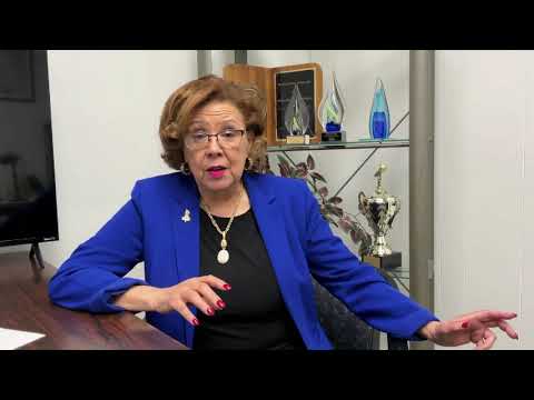 Lady from The New Journal and Guide encourages viewers to "Renew Today!