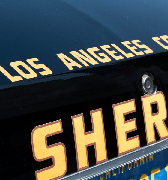 Los Angeles police officers get ready to respond to a call. Despite offering $50,000 rewards, the police department has a difficult time solving most hit-and-run cases, according to columnist Earl Ofari Hutchinson. Photo: iStockphoto / NNPA.