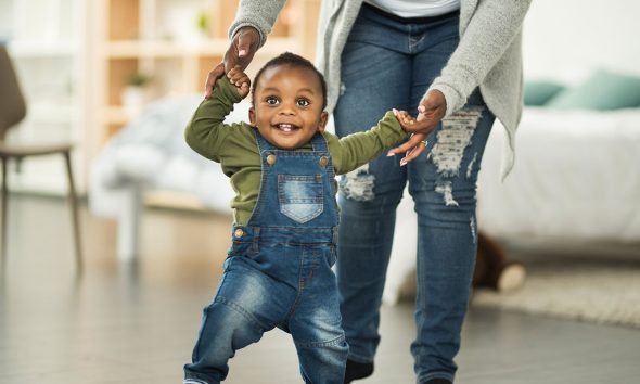 Shot of a mother bonding with her baby boy at home (Photo by Aj Watt)