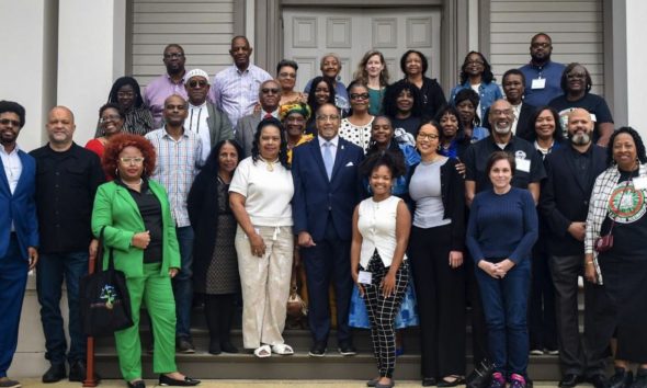 Dr. Ben Chavis, center, honored during the Mississippi Statewide Environmental Justice Climate Change Summit 2025