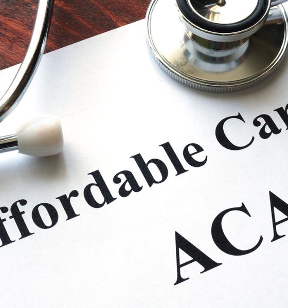 Words Affordable Care Act ACA written on a paper.