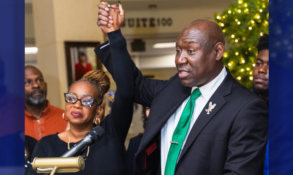 Ben Crump with Mrs Kimberly Butler, the wife of Rev. Lewis Bulter./Courtesy Crump Law.