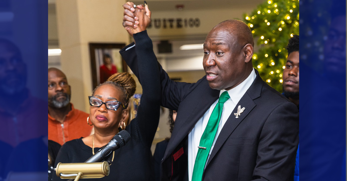 Ben Crump with Mrs Kimberly Butler, the wife of Rev. Lewis Bulter./Courtesy Crump Law.