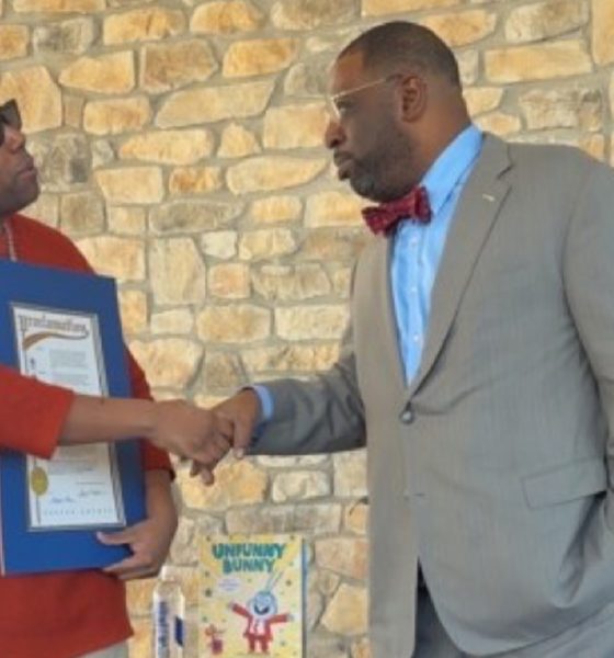 Thompson (left), with the Fulton County Proclamation, presented by Atlanta City Council member Marvin Arrington Jr.  Photo by Noah Washington/The Atlanta Voice