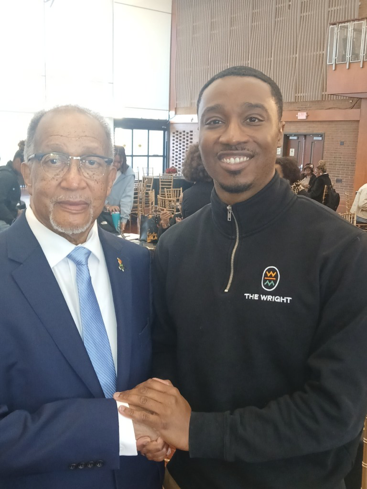 During Black Press Day 2026, held on the campus of Howard University on March 18, one recurring theme shared by featured speakers was the importance of providing more opportunities for intergenerational conversations among members of the Black Press. Pictured is Dr. Benjamin F. Chavis Jr., president and CEO, NNPA, an icon from the Civil Rights Movement, and Phil Lewis, Washington Association of Black Journalists, president, who moderated a fireside chat about the essential integration of AI in Black Press newsrooms during the program and who represents the cadre of young Black journalists who are making their way in the industry. Credit: AFRO Photo/D. Kevin McNeir.