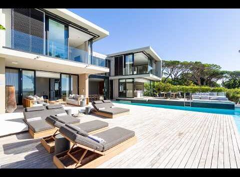 Villa Serenity, a luxurious estate featured in African News Digest, showcasing elegant architecture and serene surroundings.