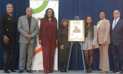 NNPA Fund members stand with family members of the late Bernal E. Smith II, who was honored during this year’s enshrinement ceremony. From left to right: Kelly Hodges, executive director; John Warren, board member; and Karen Carter Richards, chair; Smith’s wife, Tawonda Peete-Smith; daughter, Brianna Smith-Herman; and sister, Cher D. Smith. Pictured at the far right is Dr. Benjamin F. Chavis Jr., president and CEO of NNPA. The ceremony took place on March 18 on the campus of Howard University during the NNPA Fund’s Black Press Week. Credit: AFRO Photo/D. Kevin McNeir.