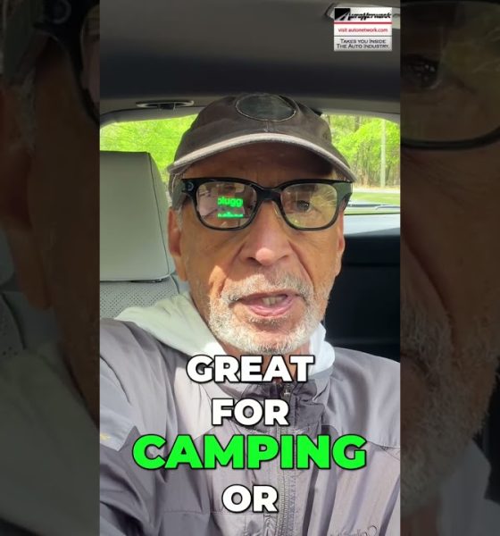 Man wearing a cap and glasses sits in a car; on-screen text reads 'GREAT FOR CAMPING OR'