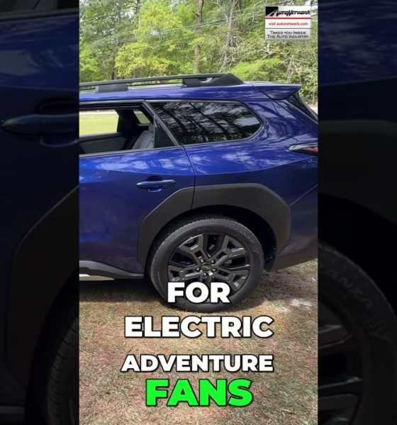 Blue SUV seen from the side with a roof rack, outdoors, overlaid by bold white and neon green text: 'FOR ELECTRIC ADVENTURE FANS'.