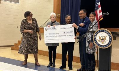 Olivia Lomax (left), lifelong Turner Station resident; Baltimore County Executive Katherine Klausmeier; Gloria Nelson, president of Turner Station Conservation Teams; Congressman Kweisi Mfume (D-M.d.-07); and Arkia Wade, founder of Neighborhood Companions, celebrate a $3.15 million grant to support flood resiliency in Turner Station. The federal grant was delivered to the community on March 12. Credit: AFRO Photo/Megan Sayles