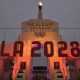 An LA2028 sign in front of a blazing Olympic cauldron at the Los Angeles Memorial Coliseum on Wednesday, Sept. 13, 2017. The cauldron was lit early Wednesday morning at the stadium that was the site of the 1932 and 1984 Olympics. (AP Photo/Richard Vogel)