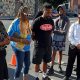 Relatives and friends of Michael Smith attend a ‘ghost bike’ ceremony for him Aug. 24 in South Los Angeles, Smith, 12, was hit by a car while riding his bike July 22. He was the 12th bicyclist to be killed in South Los Angeles this year.